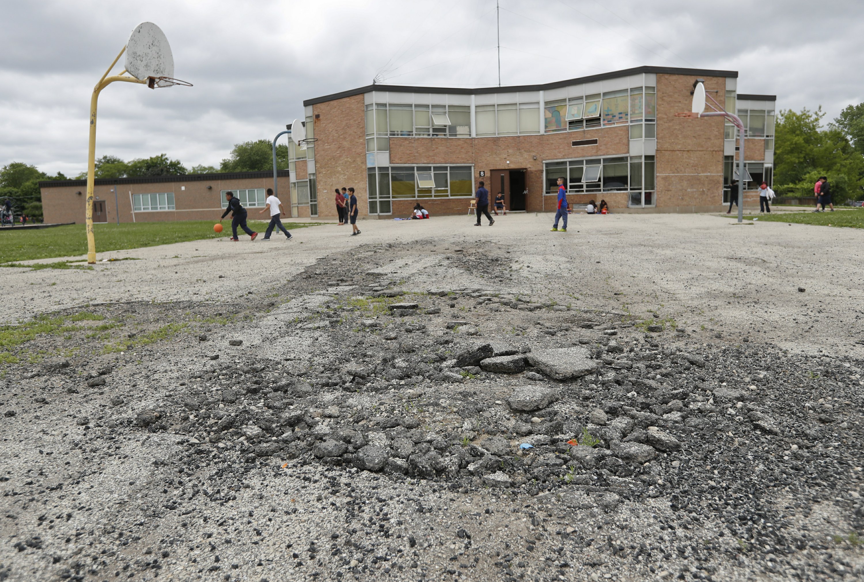 DIVIDED AMERICA: In recovery, many poor schools left behind | AP News