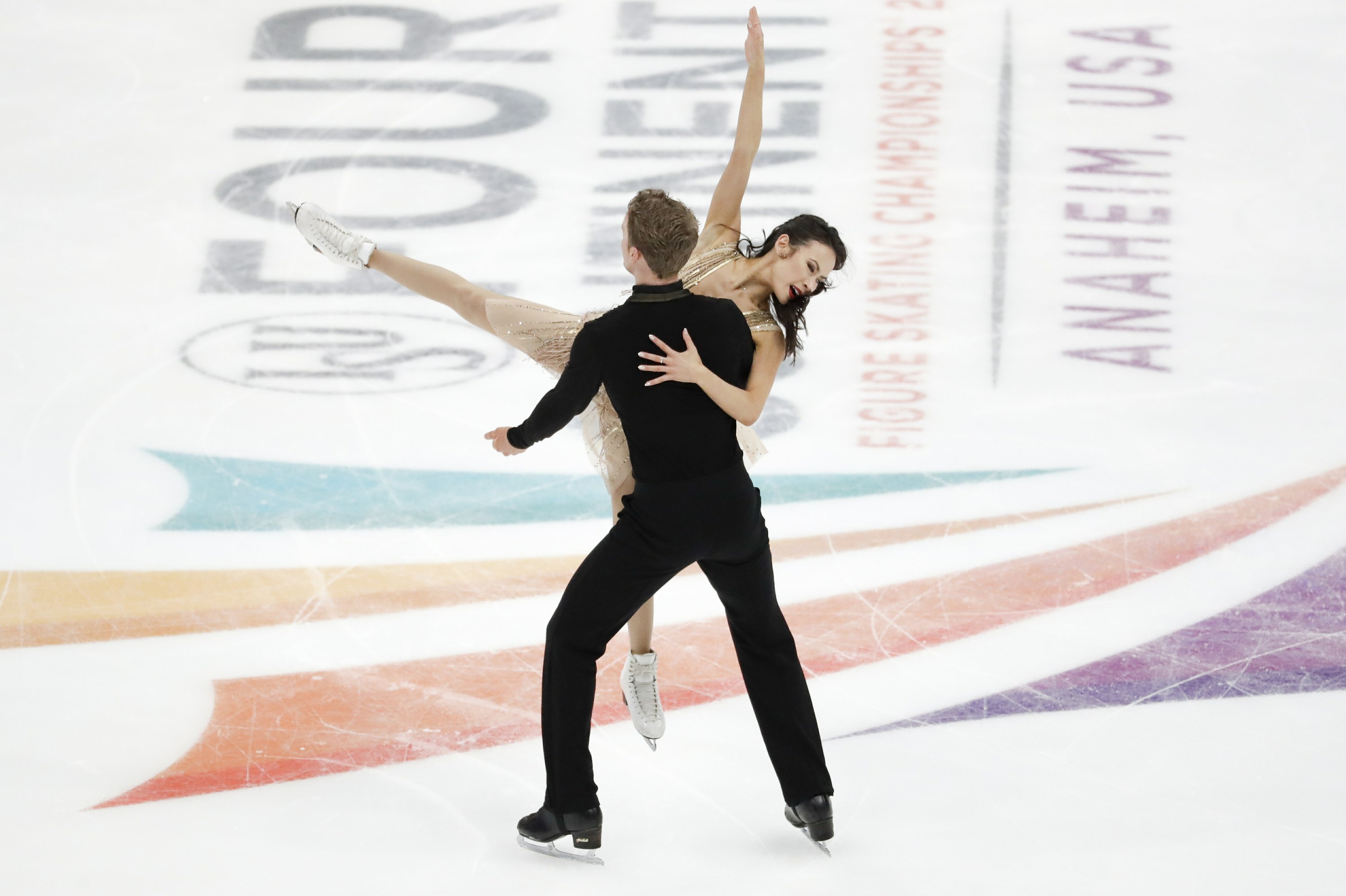 Americans Chock and Bates win ice dancing at Four Continents AP News