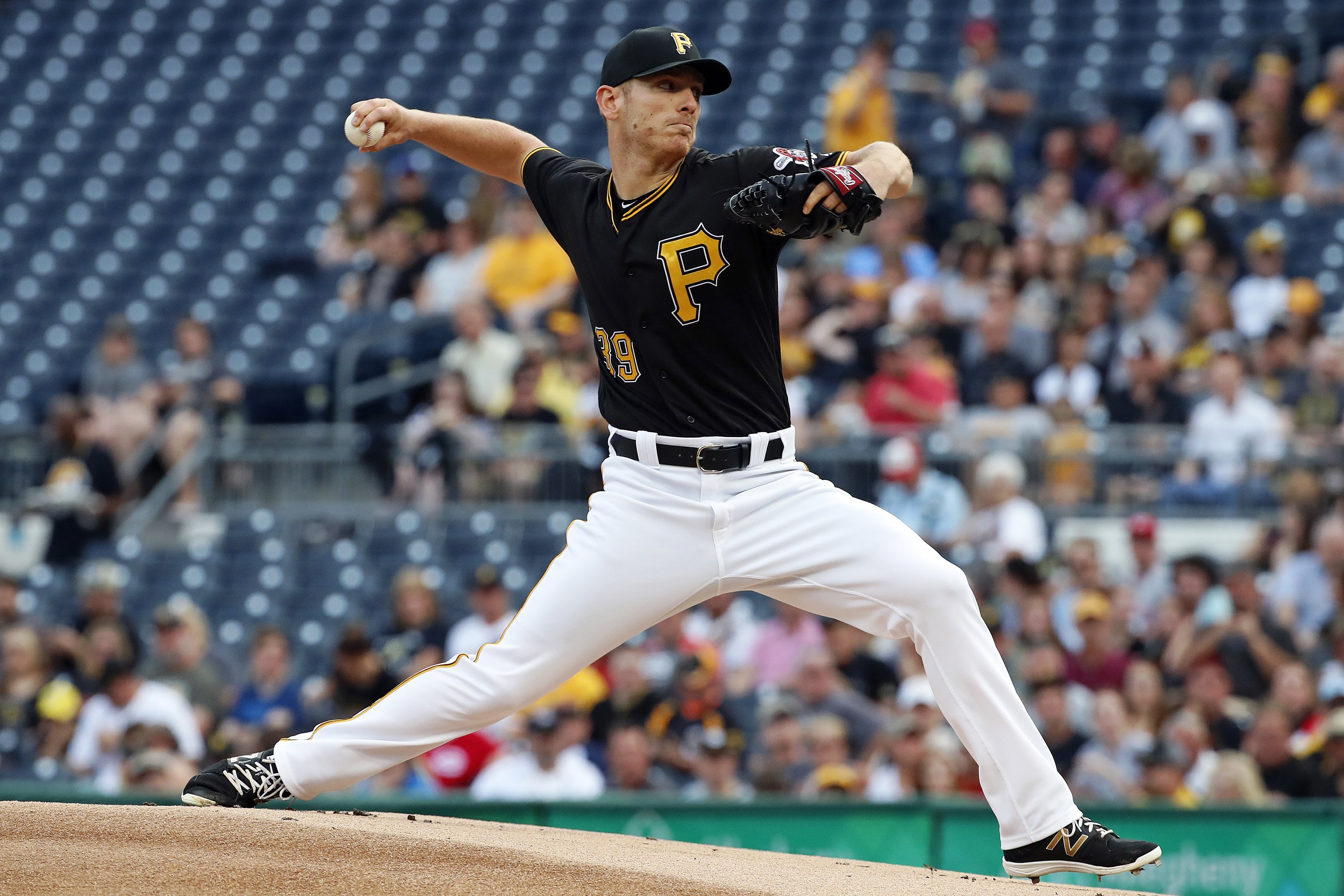 Kuhl goes 6, snaps winless streak as Pirates beat Reds 3-2 | AP News