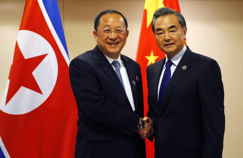 Ri Yong Ho, Wang Yi
