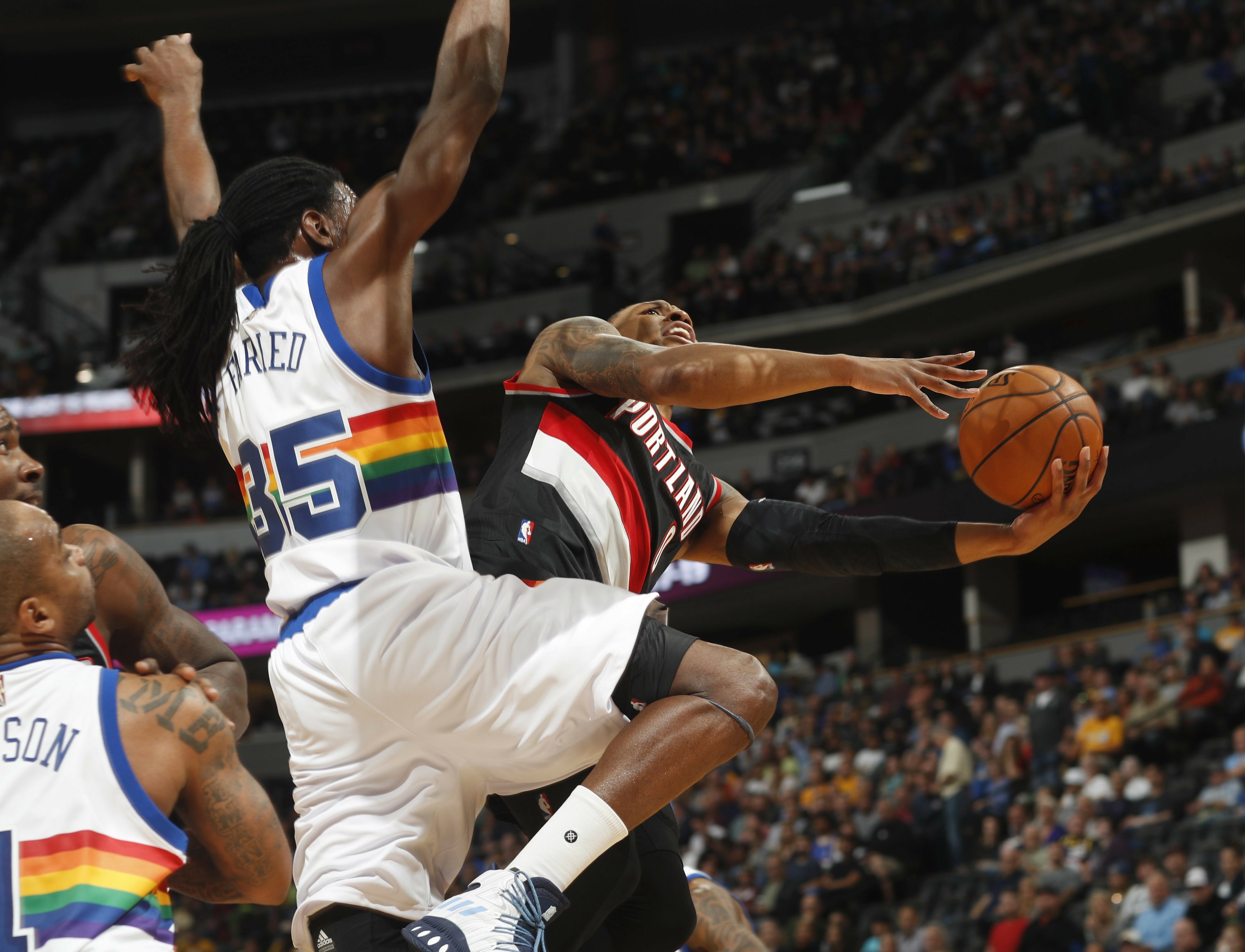 dikembe mutombo rainbow jersey