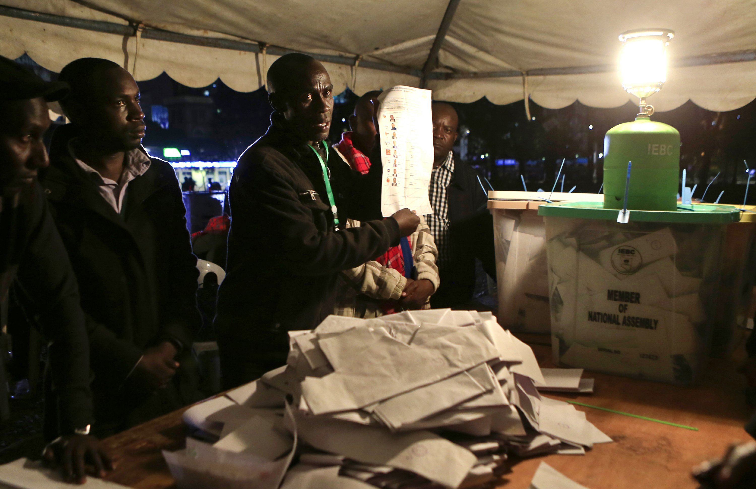 Vote count begins in Kenya's fiercely contested election AP News