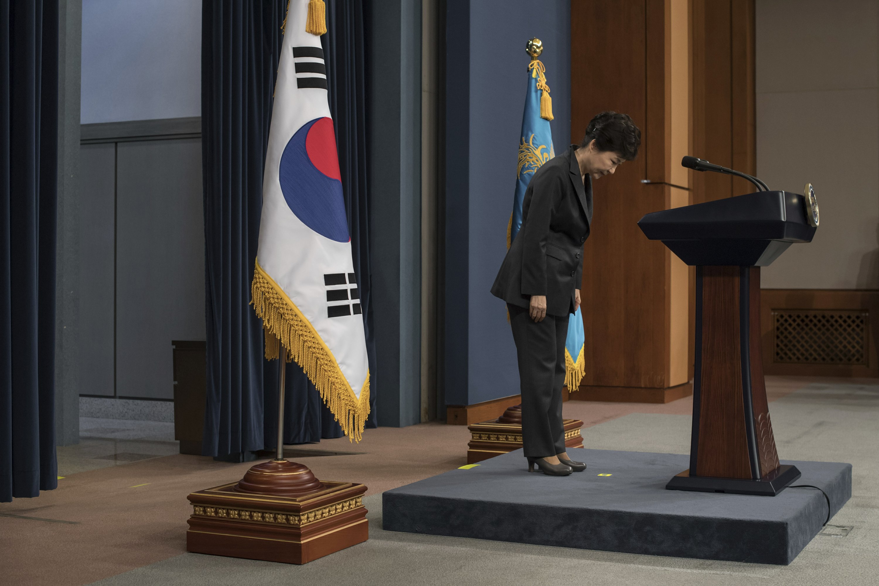 Voice shaking, S. Korean leader says scandal 'all my fault'