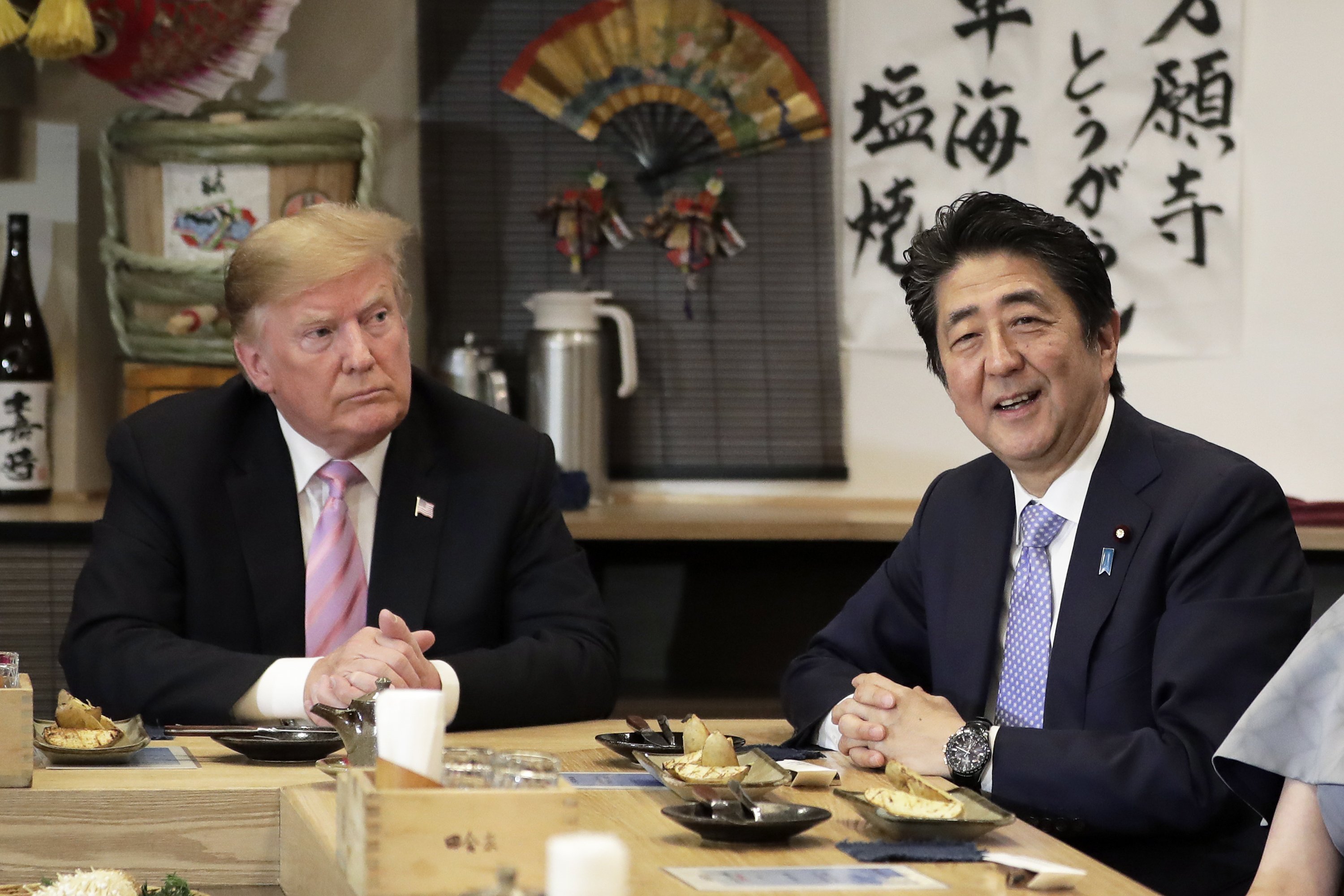 The Latest Trump to meet Japan's emperor, talk with Abe