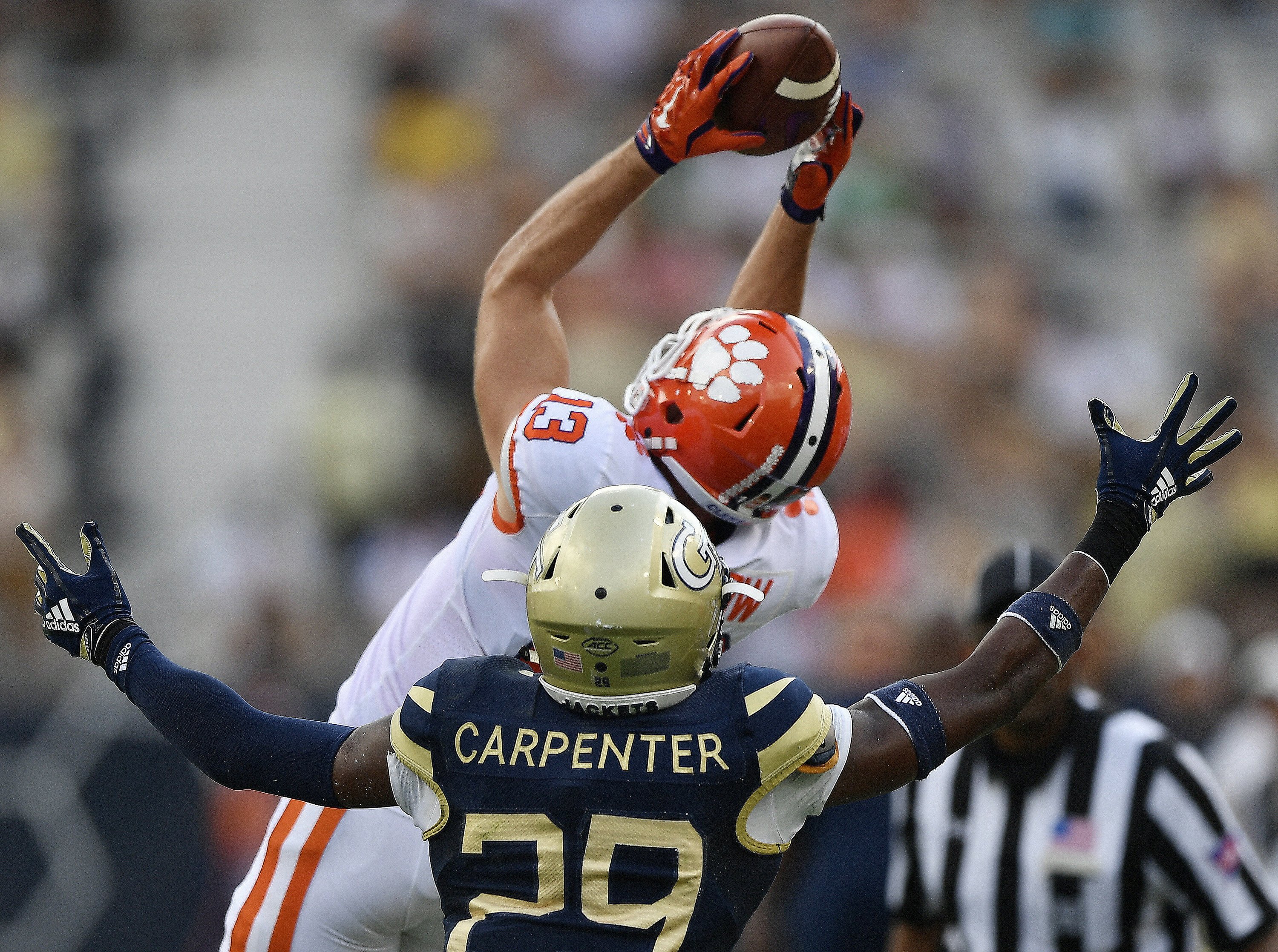 Lawrence Throws 4 Tds No 3 Clemson Routs Ga Tech 49 21