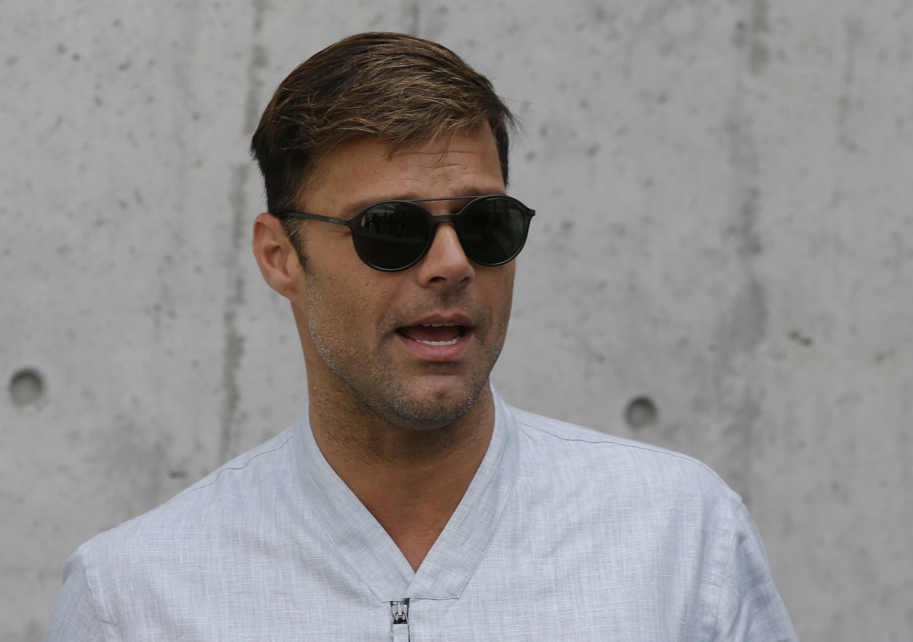Ricky Martin thanks fans for support over father's illness AP News