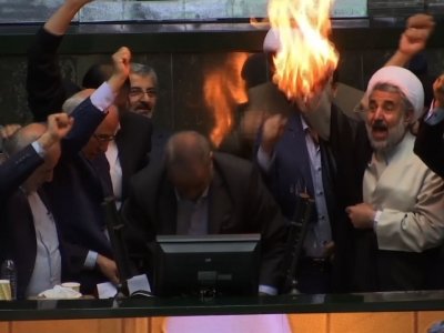 Raw: Iranian Lawmakers Burn Paper US Flag