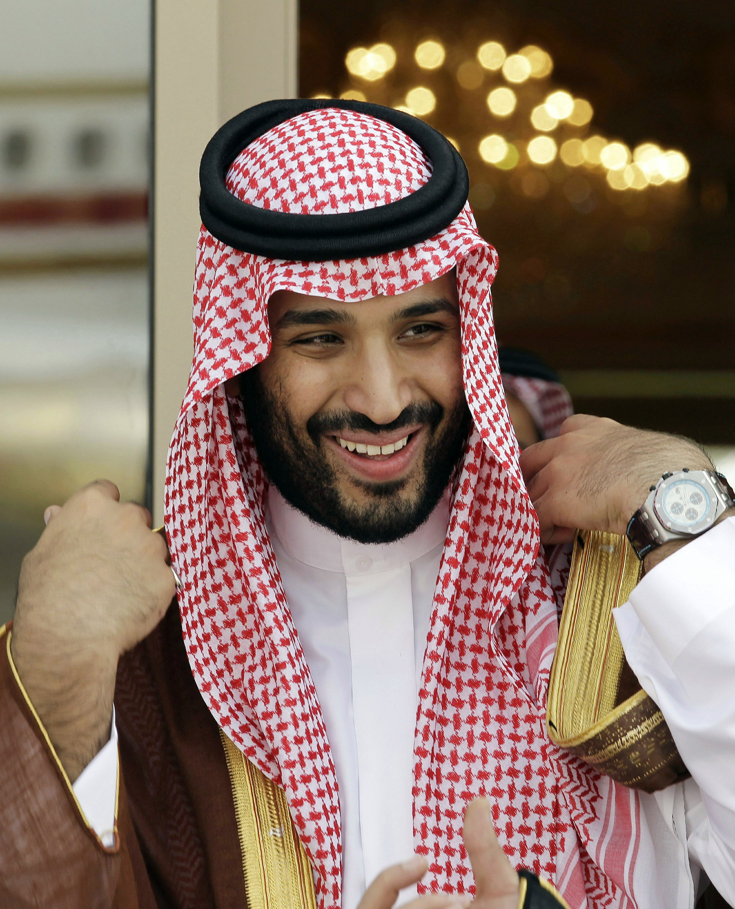 Saudi king names son heir as new generation encircles throne | AP News