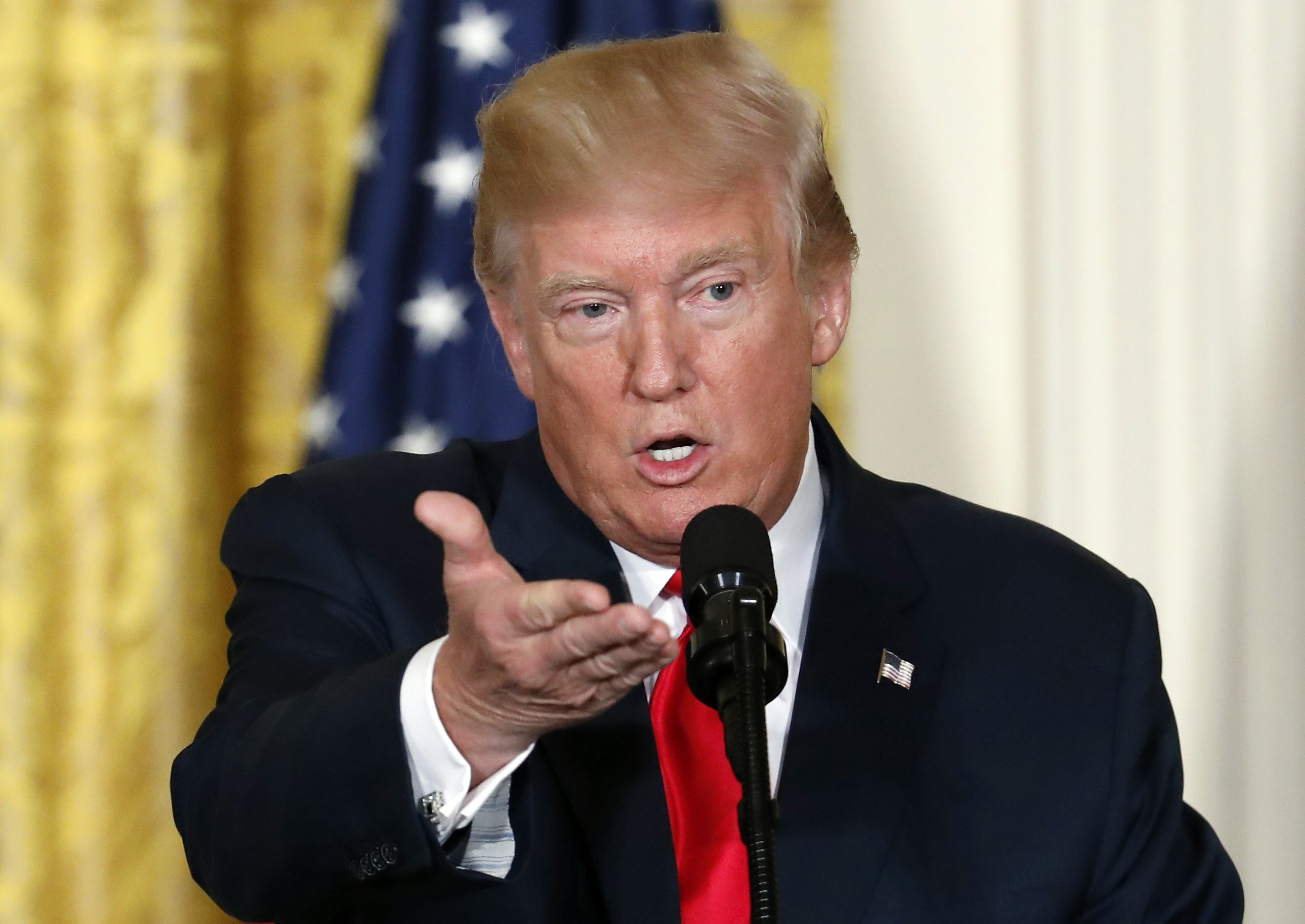 No fire or fury, but muted Trump response to NKorea missile