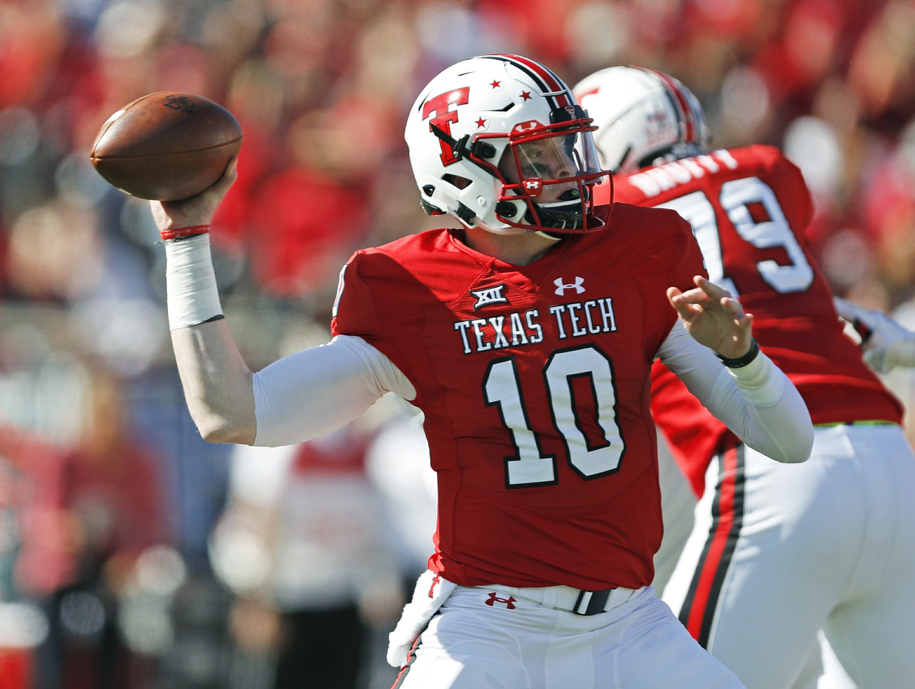 Bowman back with 408 yards 3 TDs in Texas Tech win over KU AP News