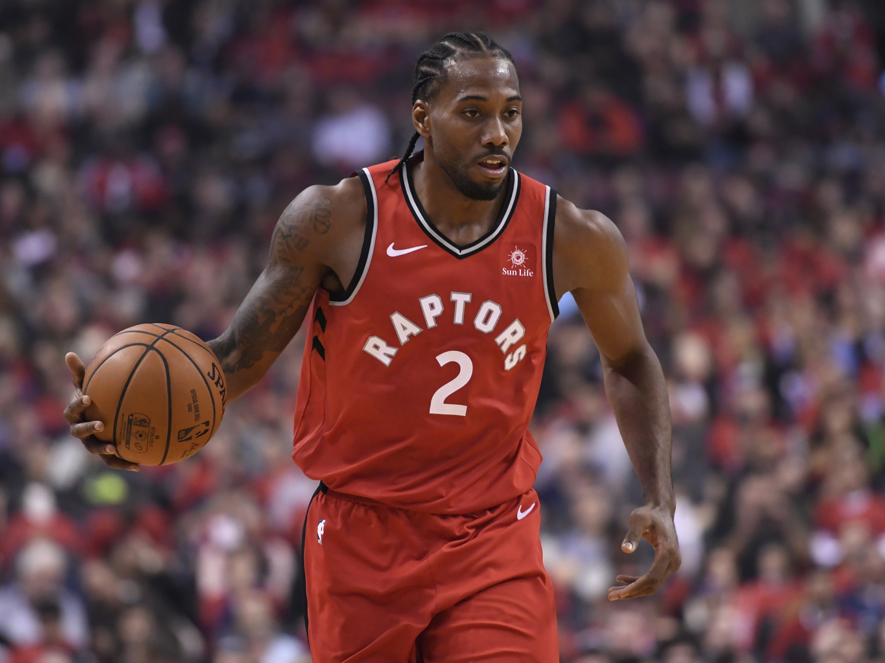 Newcomer Leonard scores 24 as Raptors beat Cavaliers 116-104 | AP News