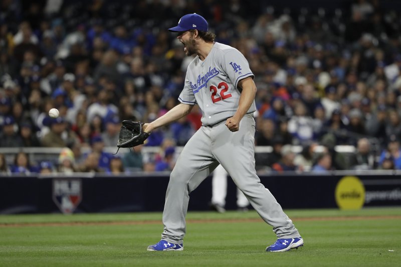 Los Angeles Dodgers starting pitcher Clayton Kershaw reacts after a called ball by umpire Toby Basner while throwing to San Diego Padres’ Wil Myers in the eighth inning of a baseball game Saturday, May 6, 2017, in San Diego. (AP Photo/Gregory Bull)
