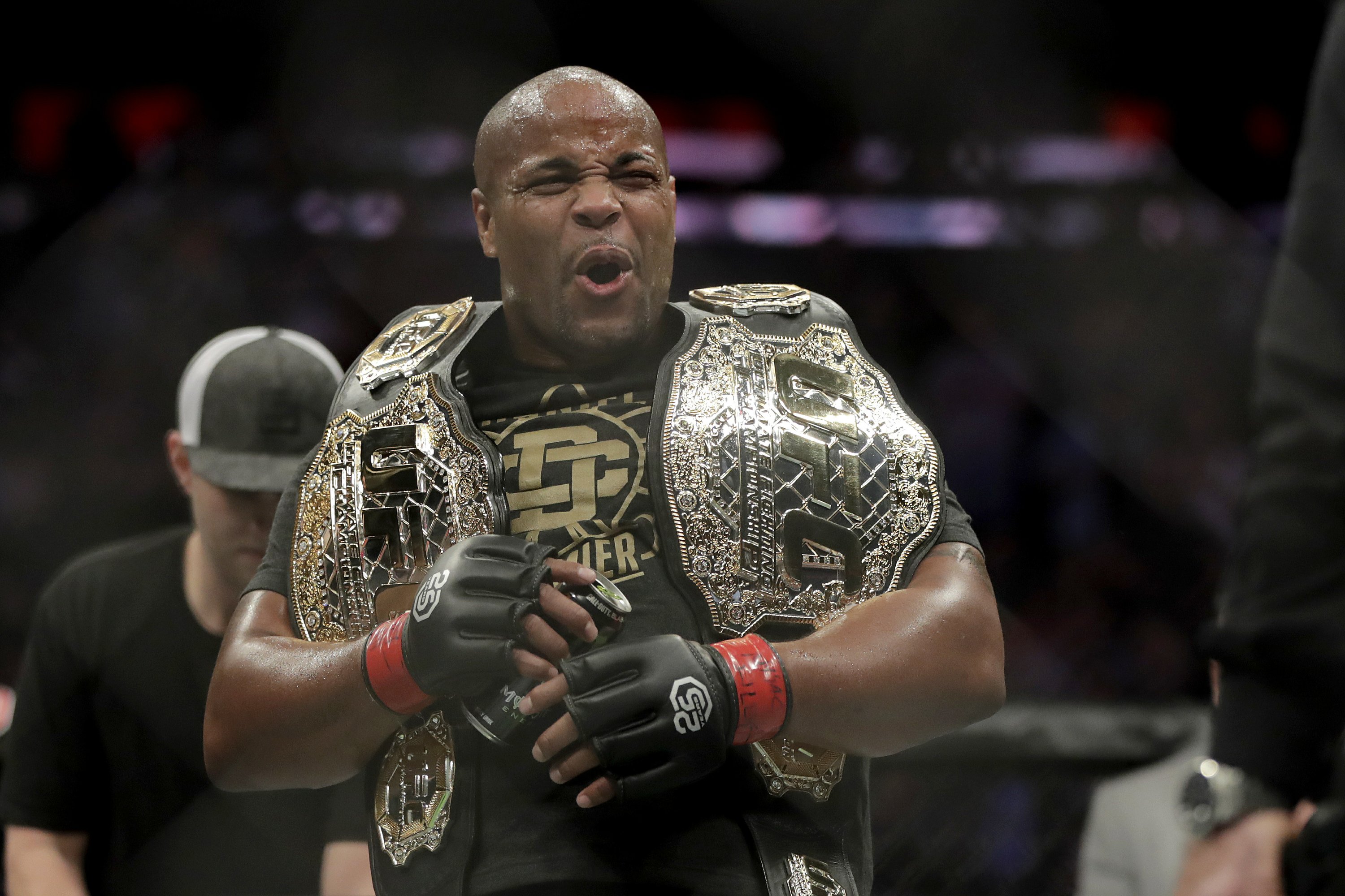 Cormier chokes out Lewis; defends 2nd title at UFC 230