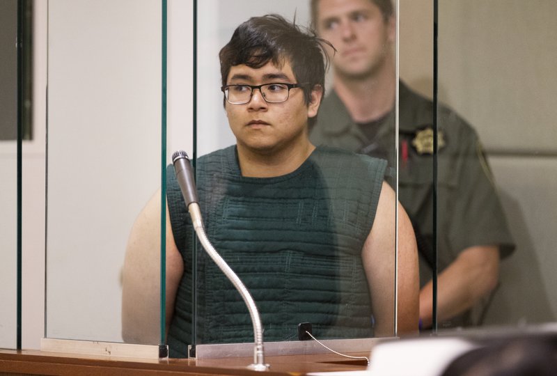 Image result for Video shows high school coach disarming and hugging suicidal student