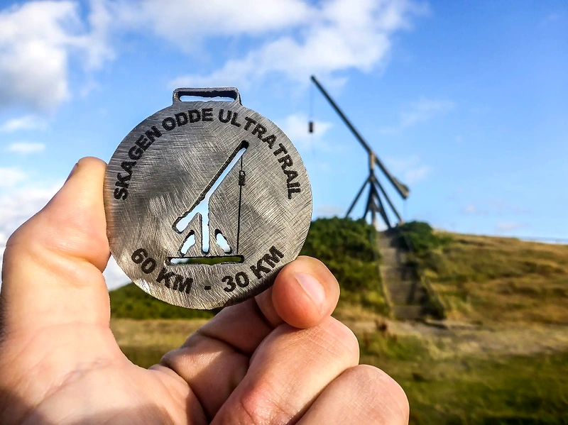 Skagen Odde Ultratrail medalje. 60km og 30km.