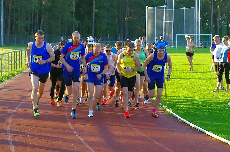 Kohila long-distance running series. Runners on the stadium.
