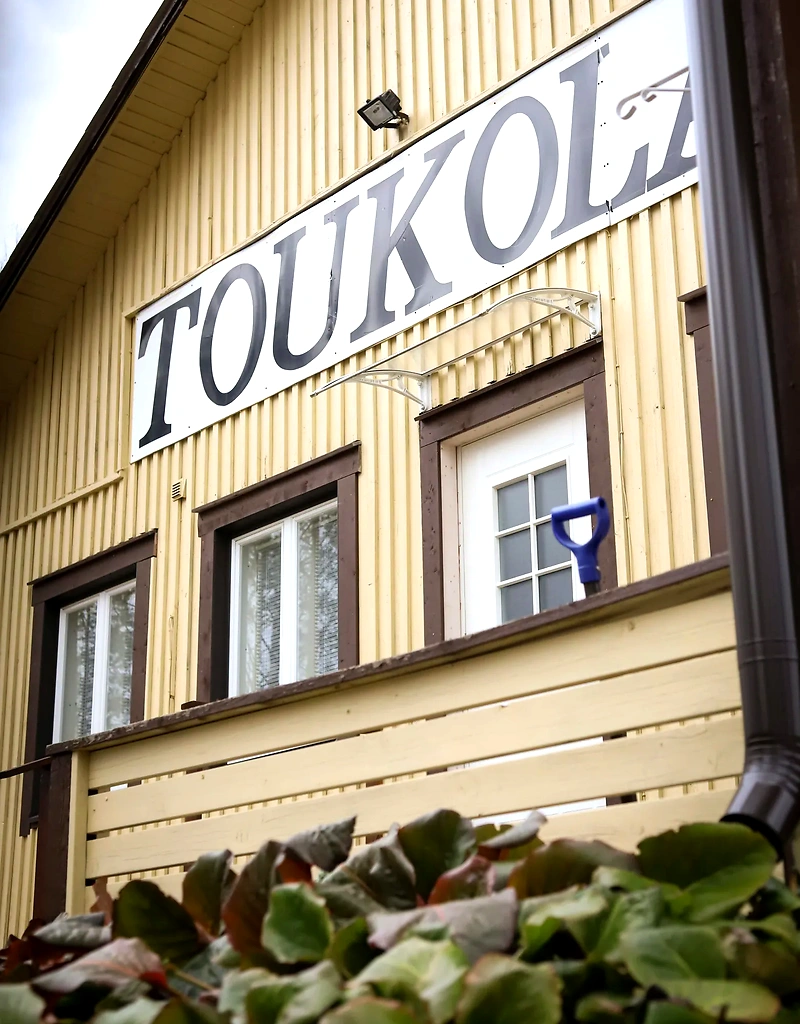 Toukola village hall sign.