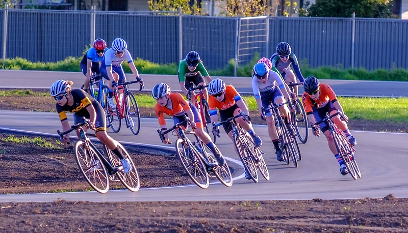 Cyclists in full speed during a road race.