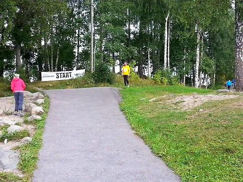 The race starts, a sign with