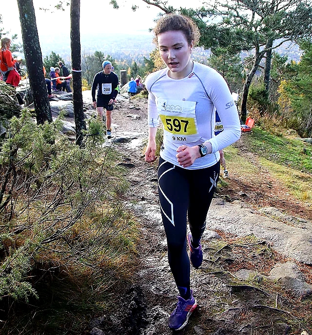 Runner in cross-country race, visible bib number, running in Nordmarka, Ivar Formo's Memorial Run.