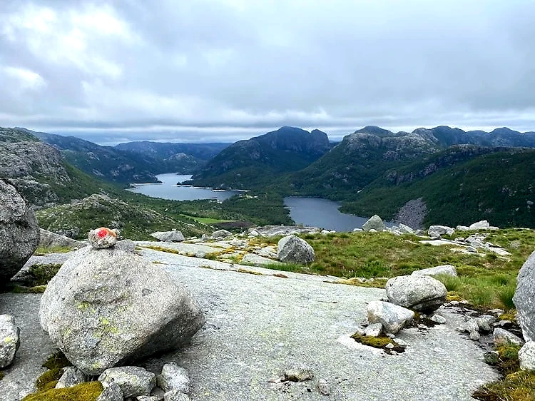 View over mountains and lakes in a beautiful landscape, with marked trails.