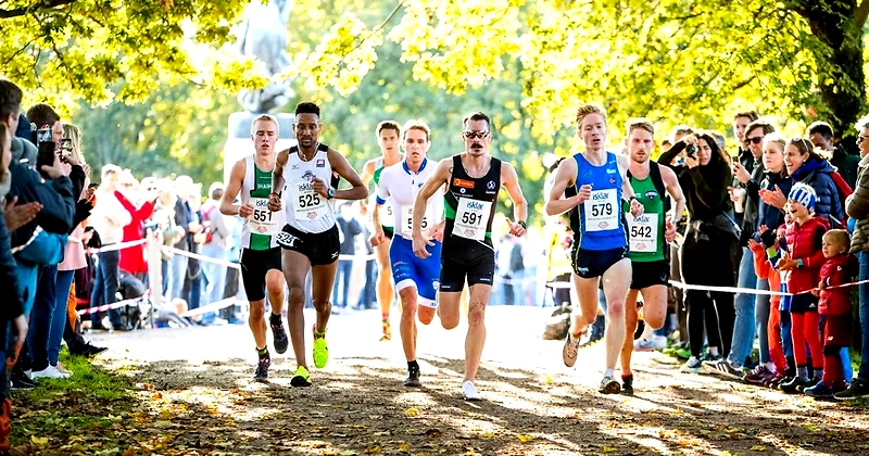 Runners in road races with an audience.
