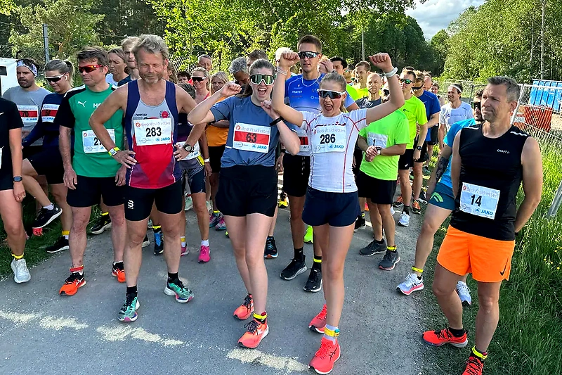 Runners ready to start in a road race.
