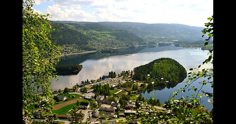 Scenic landscape with a lake and mountains, possibly from the Valdresløpet trail run.