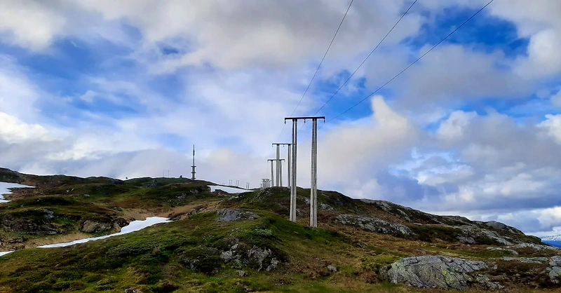 View from the mountain Veten with power lines and antenna, possibly the finish line of the course.