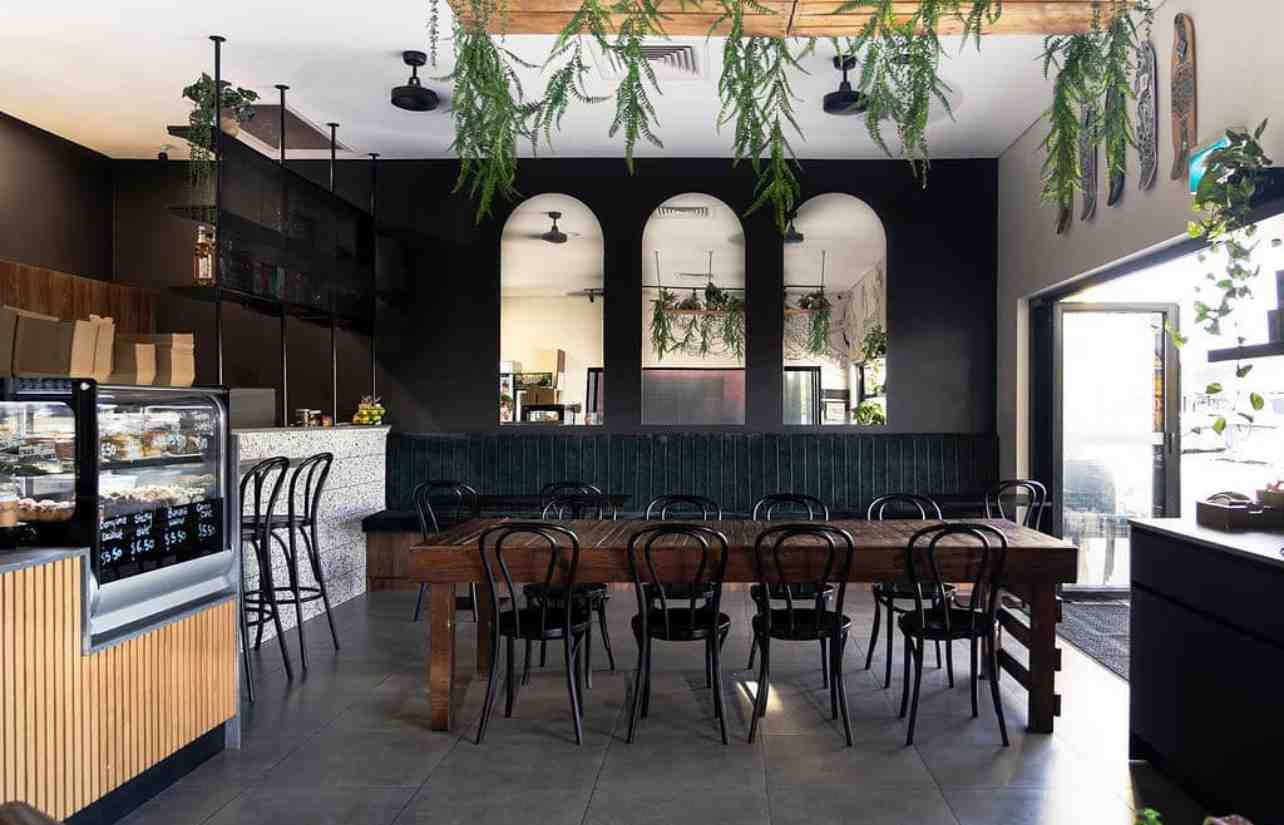 The Nines cafe's vibrant outdoor seating area - pancakes and coffee