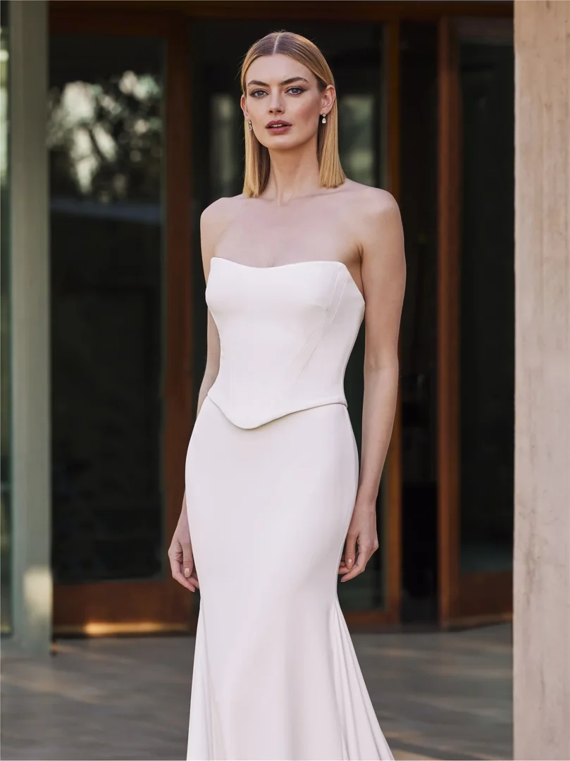 Modern crepe wedding dress with clean lines and delicate details