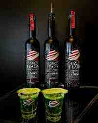 well-organized home bar with Two Flags Vodka bottles stored correctly - Does vodka freeze?