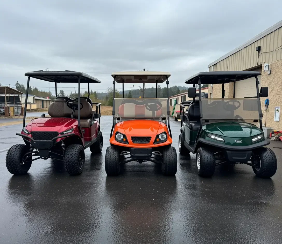 lifted golf cart tires on custom cart with all-terrain tread outdoors