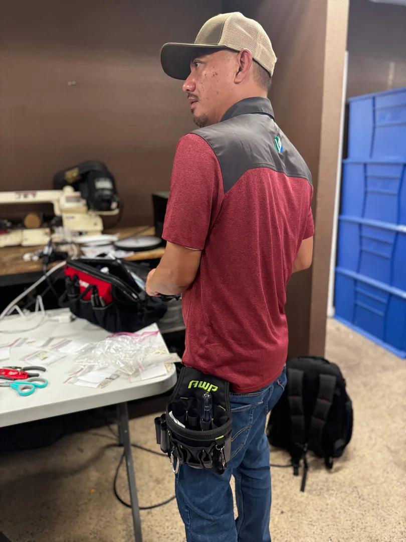 Vert Environmental California-certified lead technician performing an inspection in a residential hallway - viken xrf lead Vert Environmental California-certified lead technician performing an inspection in a residential hallway - viken xrf lead