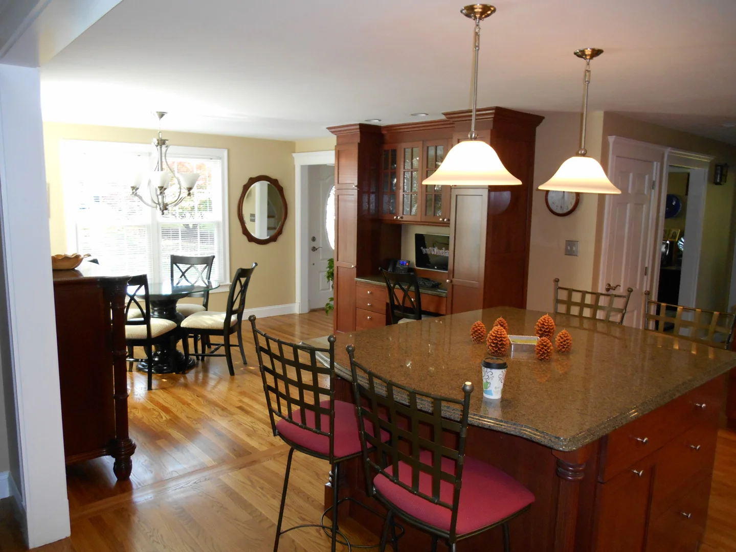 Luxury kitchen remodel featuring custom cabinetry and stone countertops - remodeling services Luxury kitchen remodel featuring custom cabinetry and stone countertops - remodeling services