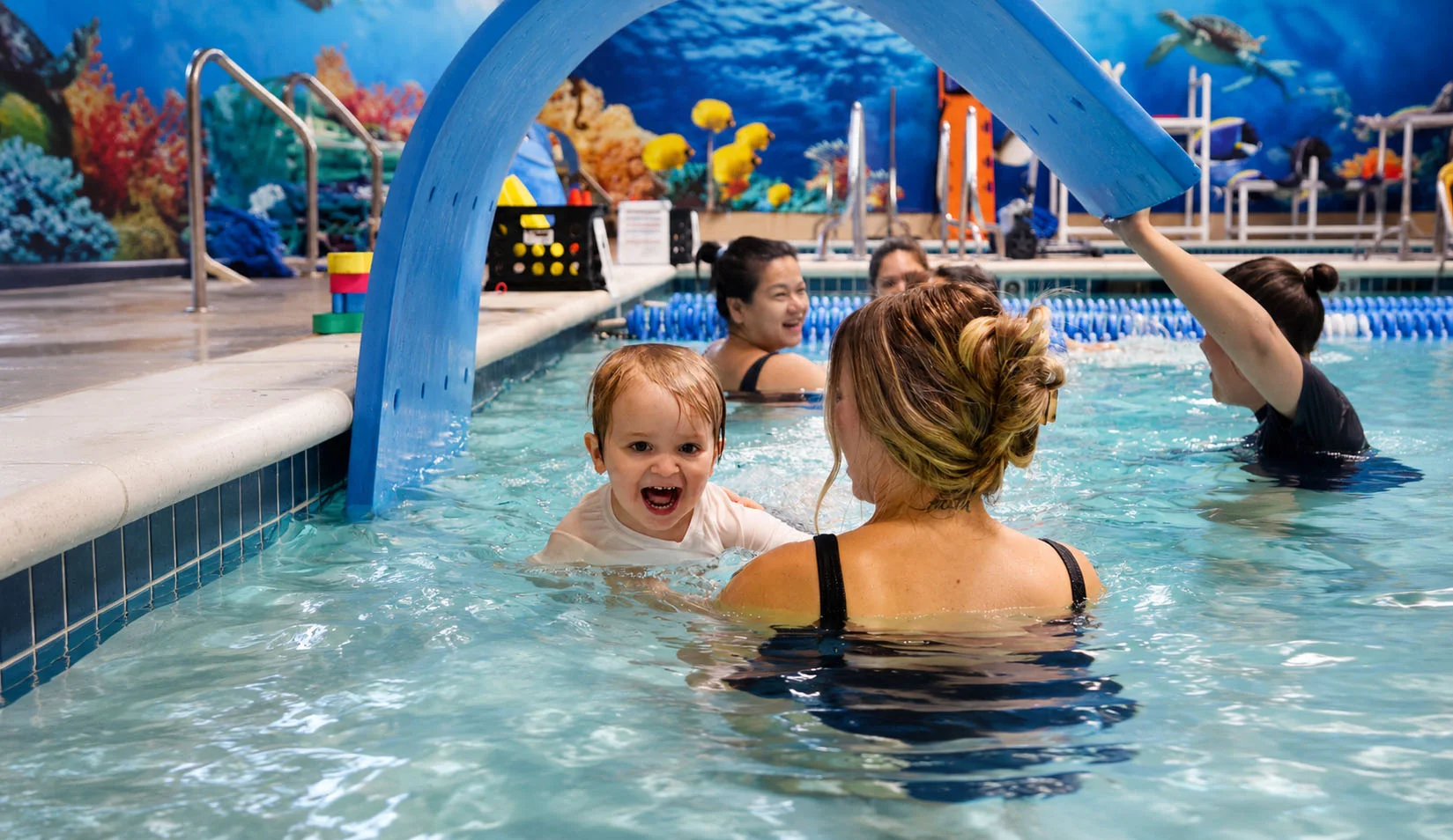 family-friendly changing suites at an indoor swim academy family-friendly changing suites at an indoor swim academy
