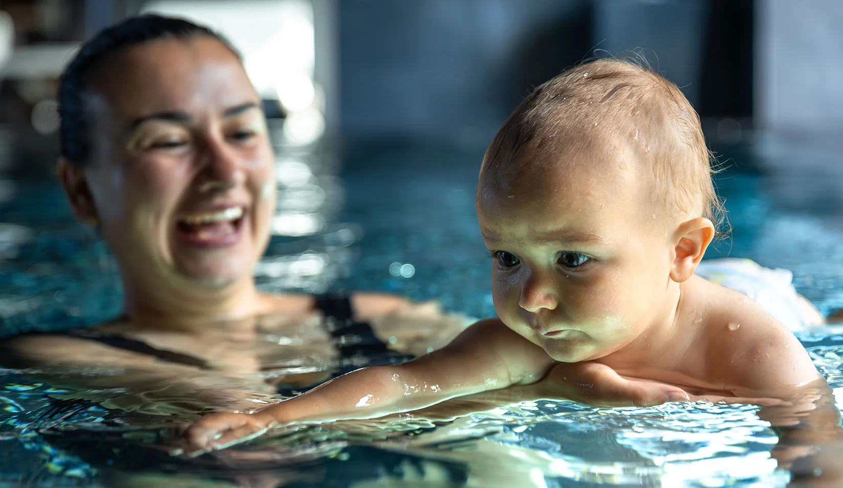 adaptive swim lesson for a child with special needs adaptive swim lesson for a child with special needs