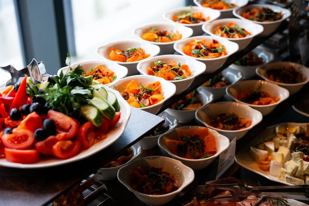 Gourmet wedding buffet with a variety of fresh seasonal dishes - catering for wedding reception Gourmet wedding buffet with a variety of fresh seasonal dishes - catering for wedding reception