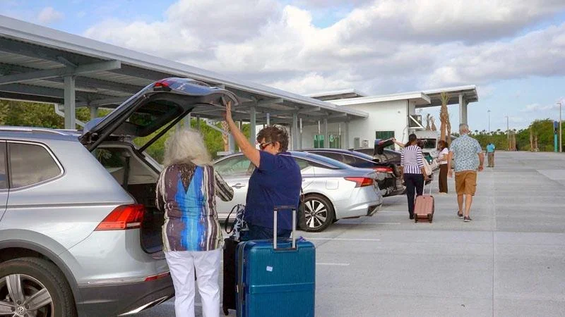 Luggage being loaded into a cruise terminal shuttle Luggage being loaded into a cruise terminal shuttle