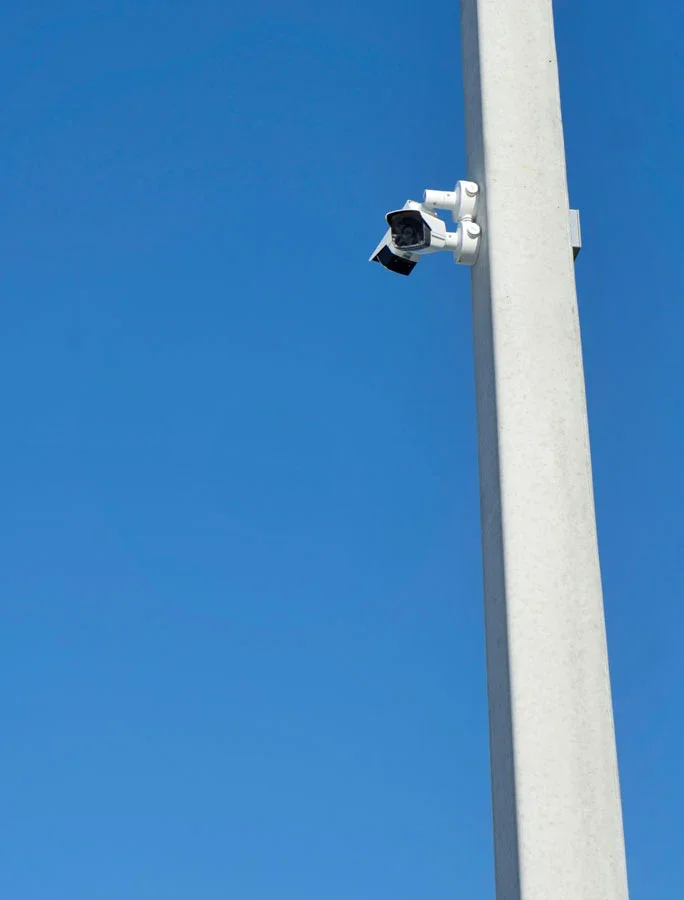 secure parking lot with high-definition surveillance cameras and perimeter fencing - easiest parking for cruises