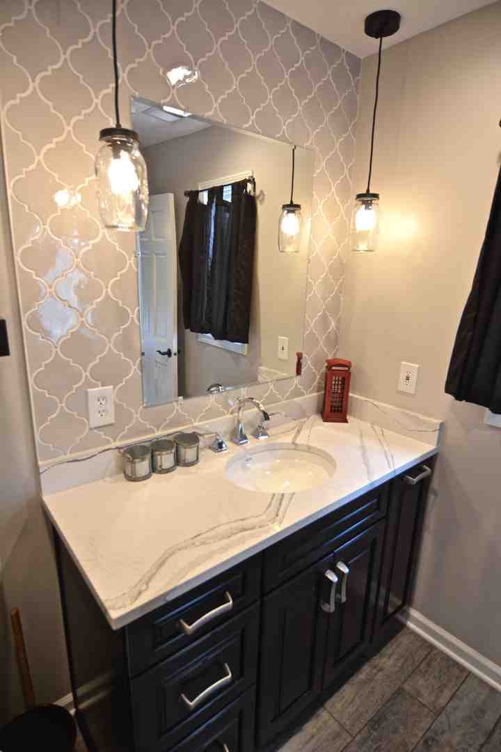 dimmer switch next to a bathroom vanity - ambient bathroom lighting