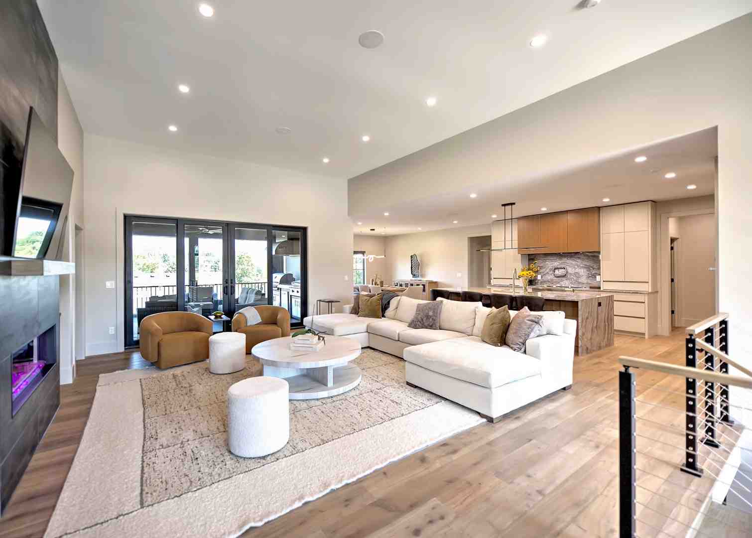 family enjoying modern living room - whole-home electrical wiring and rewiring