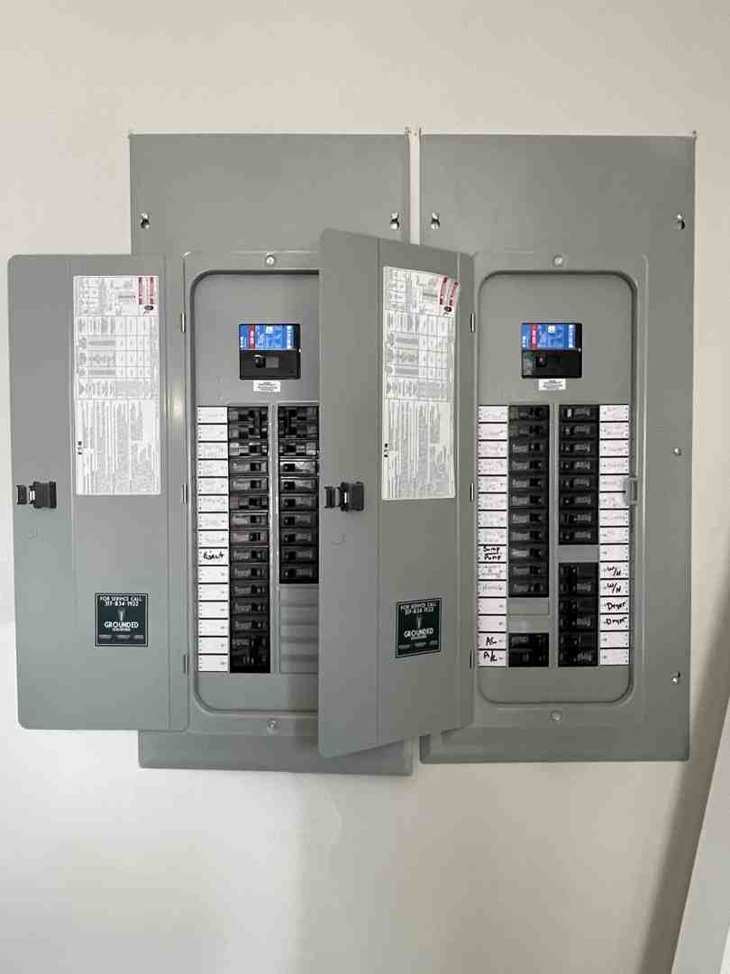 Modern home electrical panel with smart breakers and clear labeling Modern home electrical panel with smart breakers and clear labeling