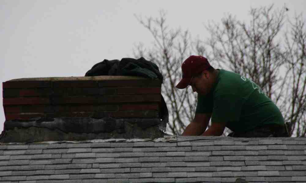 Roofing Contractor Working - replace a roof