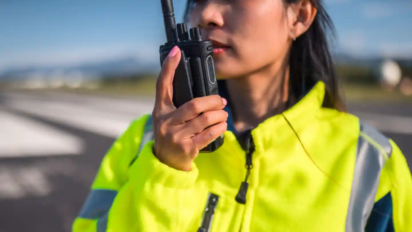professional using radio earpiece - Earpieces for Radios