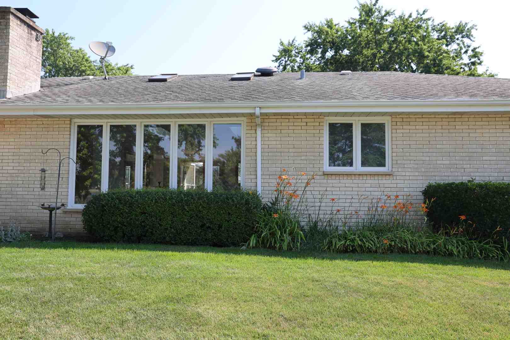 newly shingled suburban home - best residential roofers