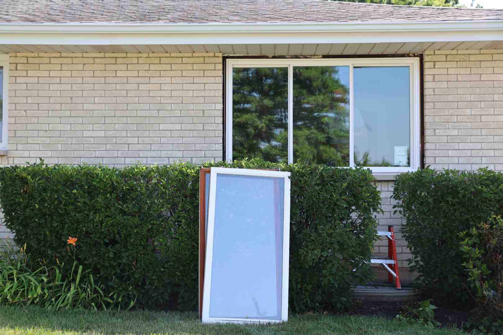 Durable vinyl window frames installed on a modern residential home