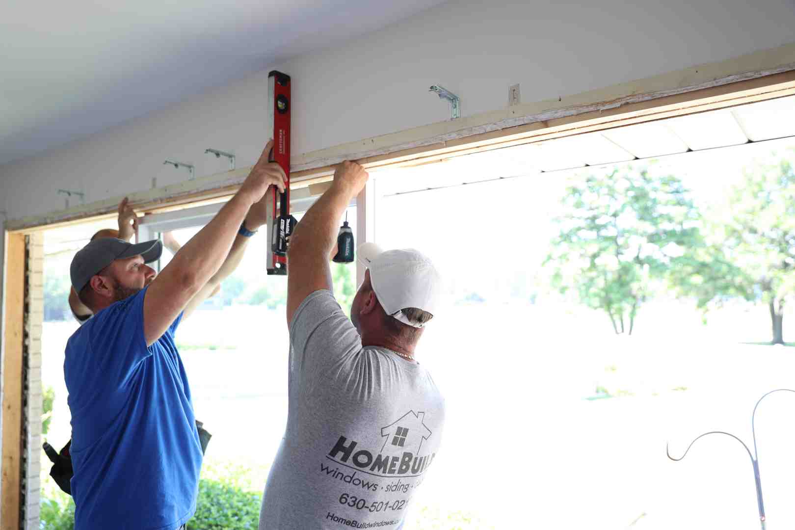 Flashing tape installation on rough opening sill