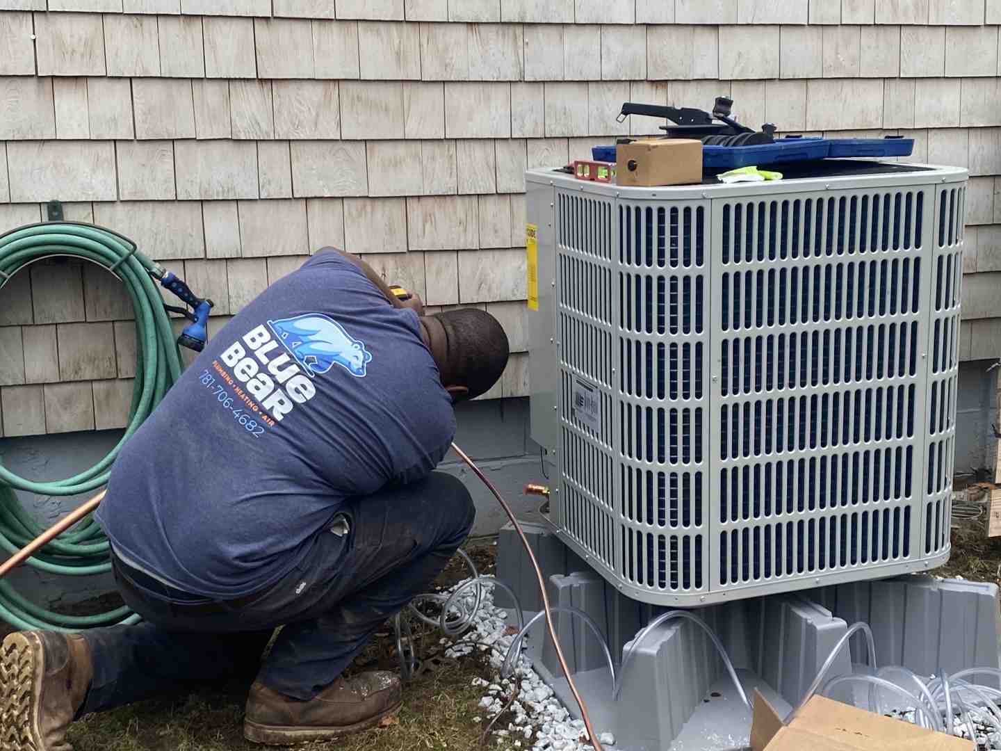 outdoor condenser unit on the side of a house with clear space around it - why is my ac blowing warm air outdoor condenser unit on the side of a house with clear space around it - why is my ac blowing warm air