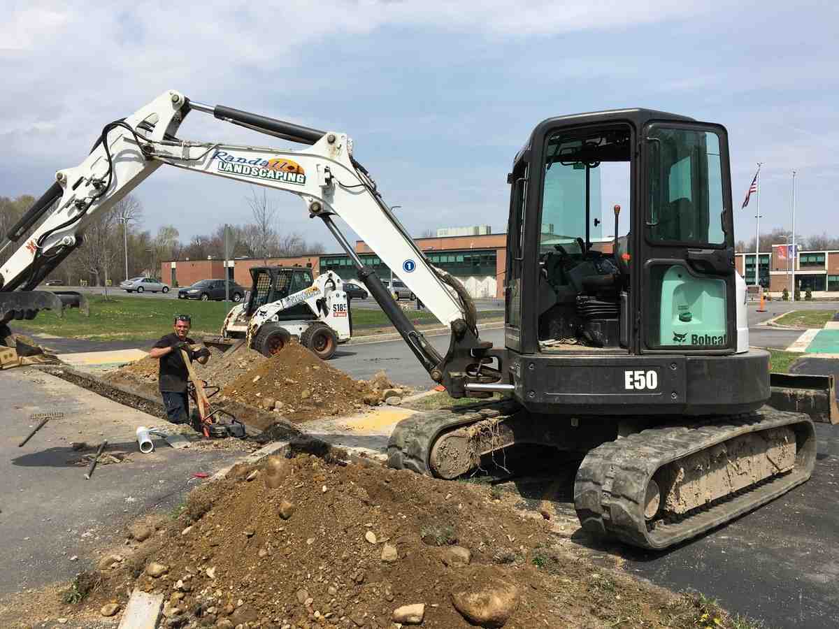 Randall Landscaping team at work - Commercial mulch installation